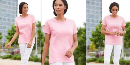 Woman wearing a Gildan G500L t-shirt in the color "light pink"