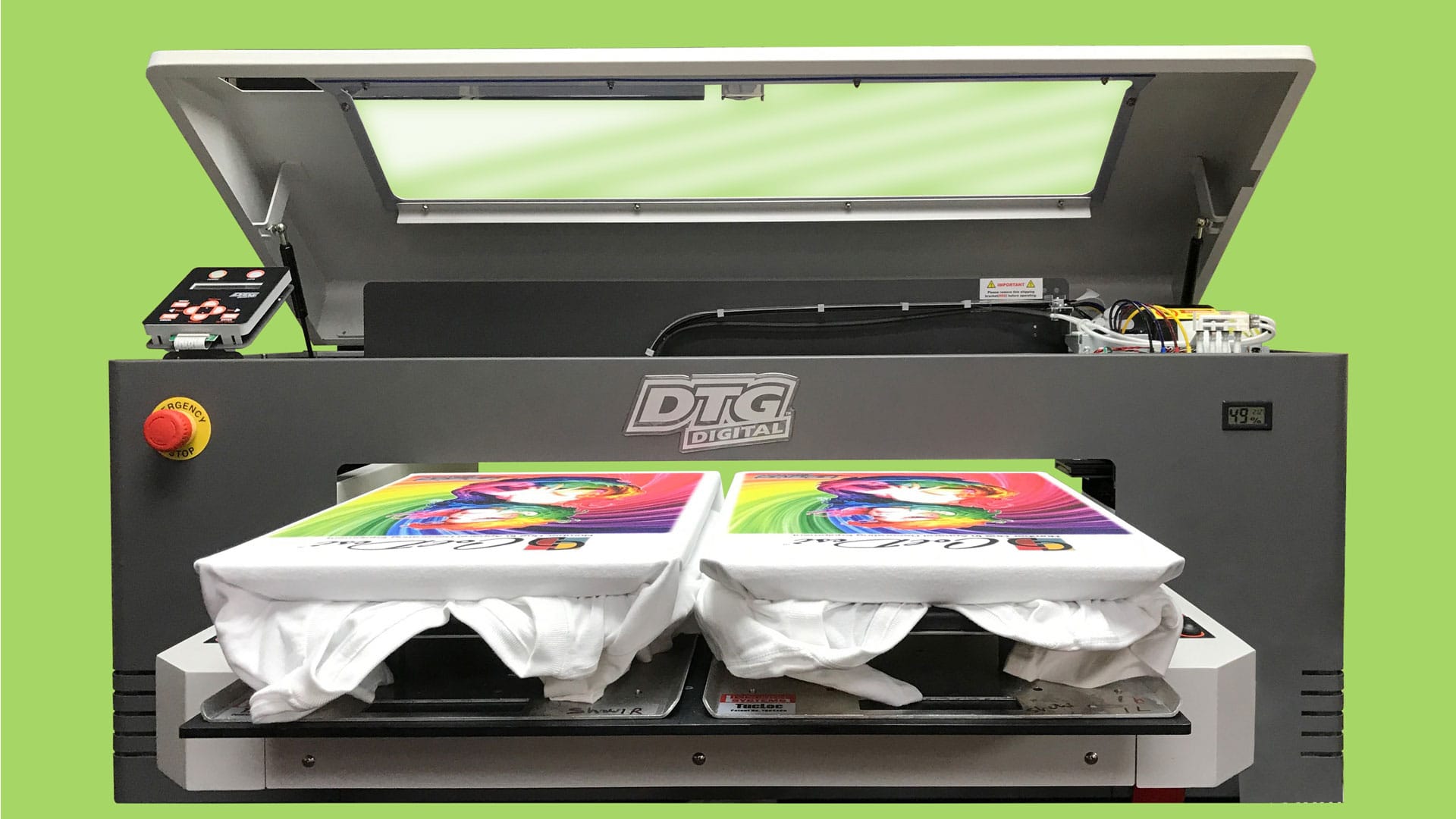 DTG Digital Printer by Coldesi with two shirts loaded and printed on