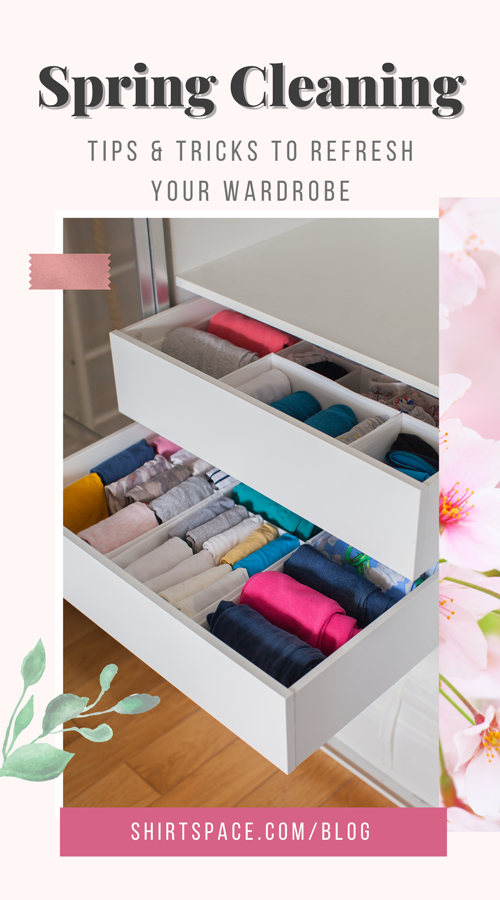 A dresser with a drawer open with clothes folded neatly and organized.