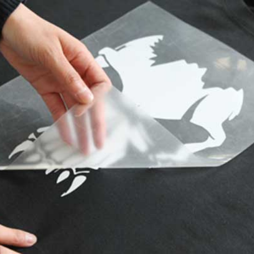 Peel heat transfers quickly for best results when printing a picture on a t-shirt