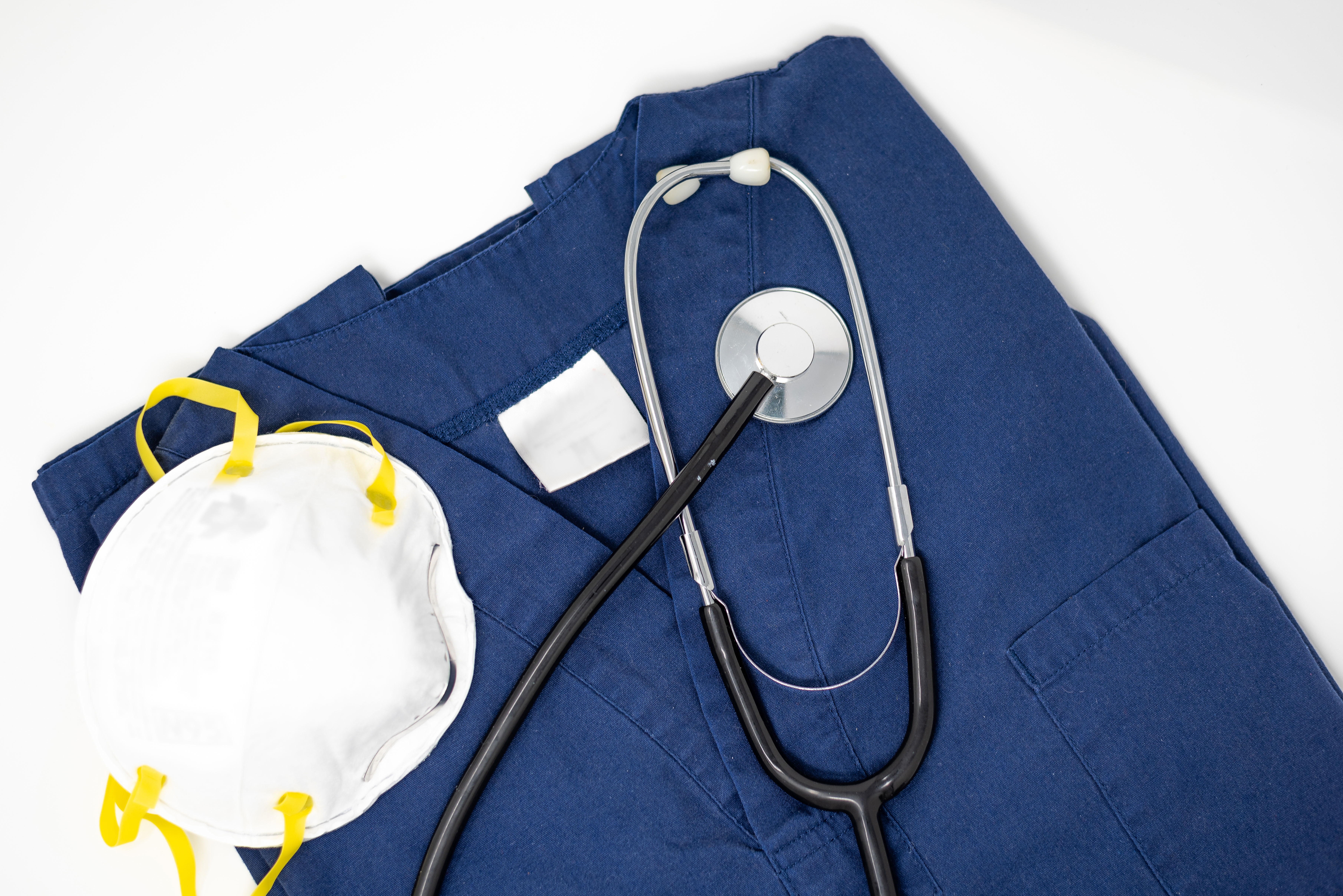 picture-of-medical-scrubs-a-stethoscope-and-a-n95-mask-shirtspace.jpg