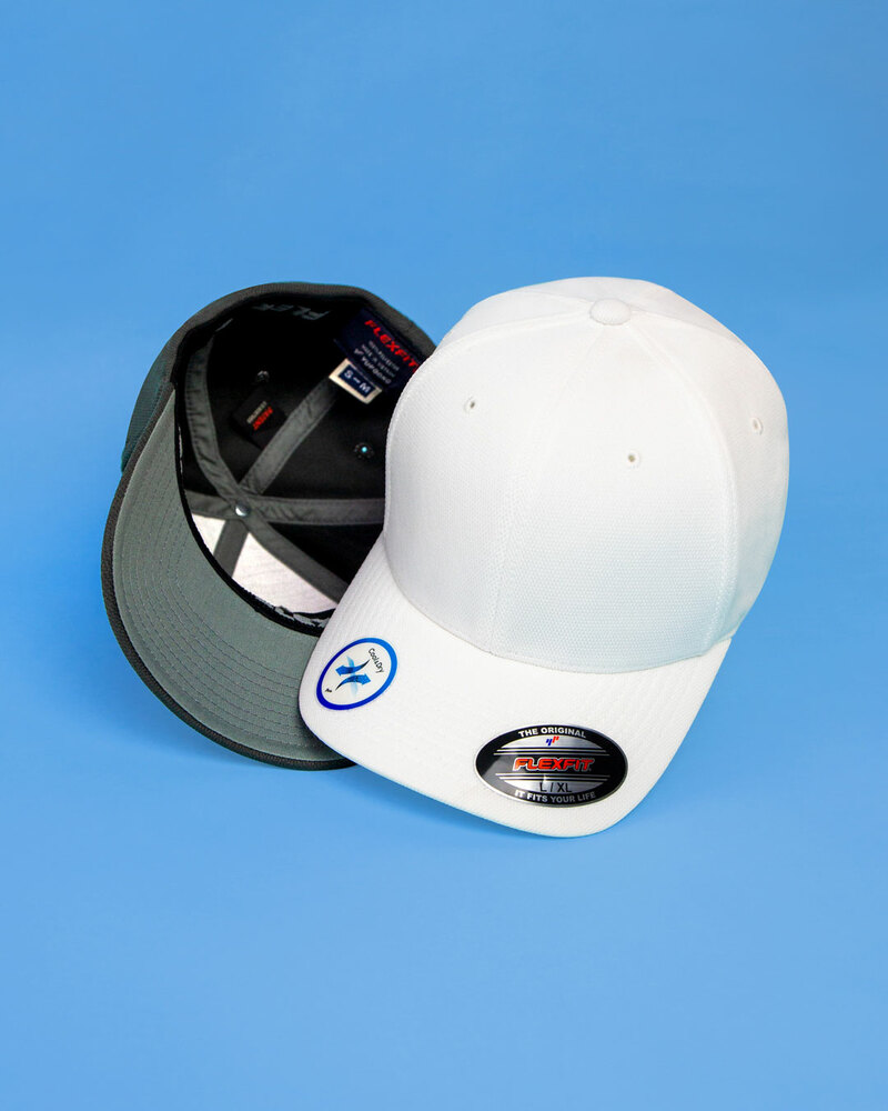 The Flexfit 6597 Adult Cool & Dry Sport Cap shown in black and white, available at ShirtSpace. 