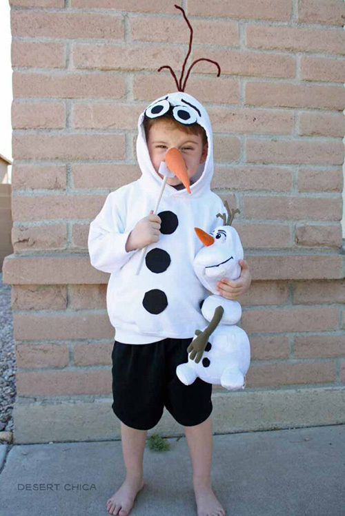 Little boy wearing a white hoodie that has been customized to look like Olaf the snowman from Disney’s Frozen movies. 