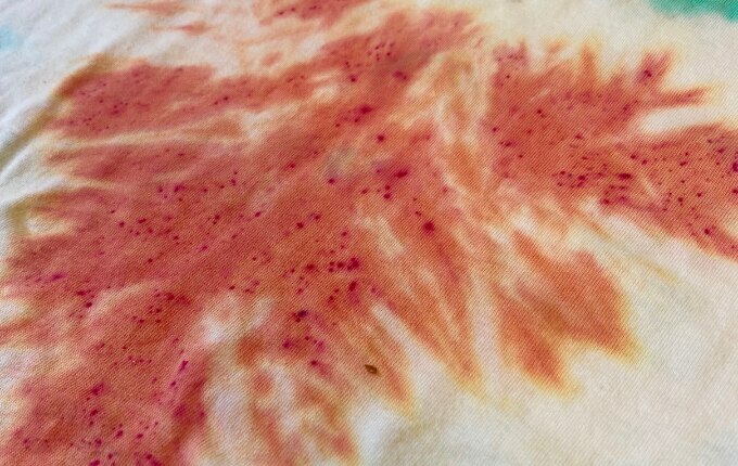Example of a common tie dye mistake which is speckled dye spots 