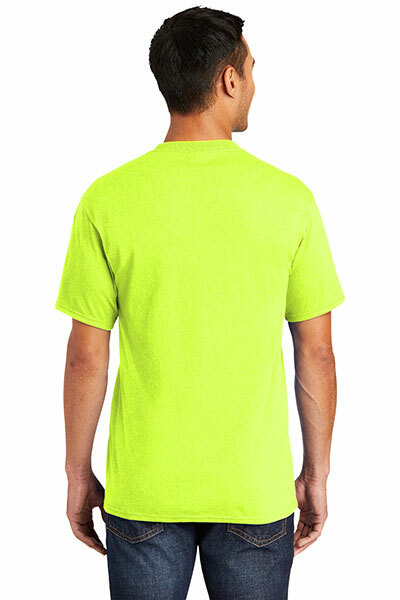 A man wearing the Port & Company PC55T tall t-shirt in the color Safety Green, available at ShirtSpace. 