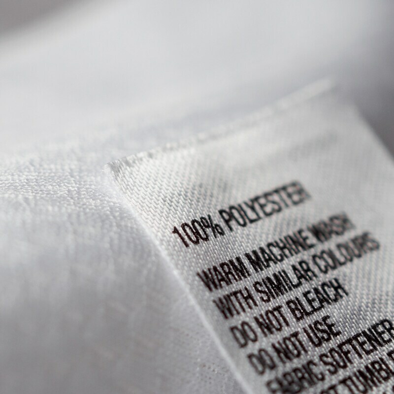 100% polyester tag of a shirt