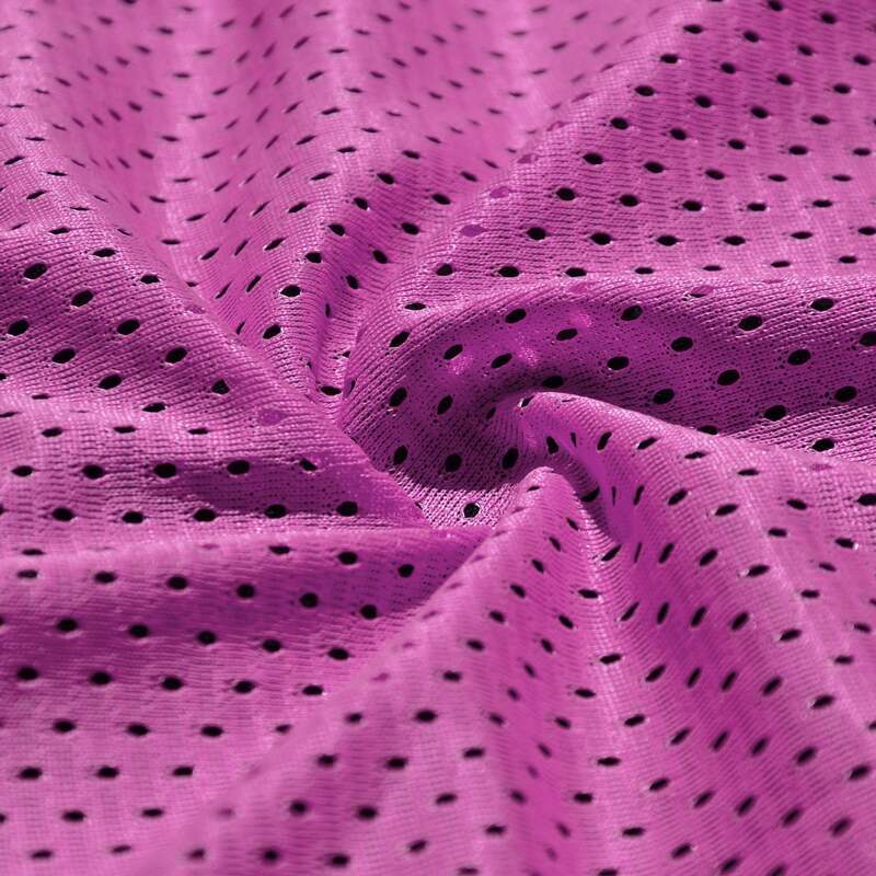 Close up of magenta polyester mesh fabric