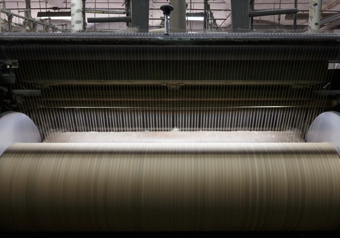 Textile loom with creating combed cotton for t-shirts and other blank apparel.