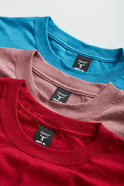 Hanes 5180 Beefy-T t-shirt necklines, laid flat, in the colors red pepper heather, mauve pepper heather and sapphire pepper heather.