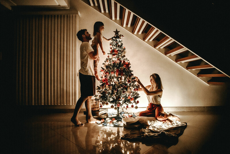 family-decorating-christmas-tree-shirtspace.jpg