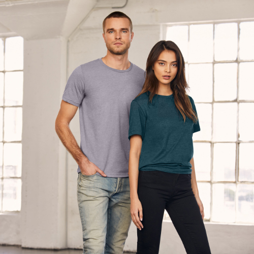 Man with light grey shirt standing next to girl with dark blue shirt